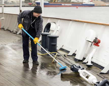 Nigel cleaning the deck.