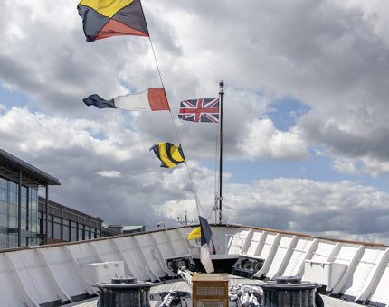 Dress flags flying the breeze on the Fo'c'sle Deck. 