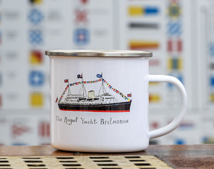 A metal mug with an illustration of the Royal Yacht Britannia. 
