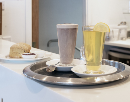 Two cups of hot drinks 