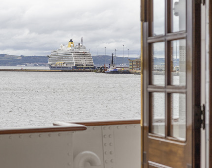 A view of a cruise ship from the Drawing Room. 