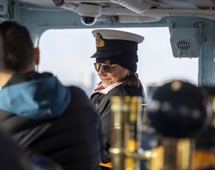 A Visitor in the Bridge wearing a Captain's hat. 