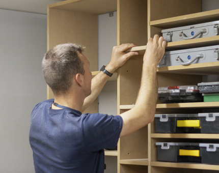 A storage unit in the Maintenance workshop being refit. 