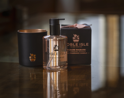 Noble Isle brand candle and hand wash in rhubarb rhubarb scent. 