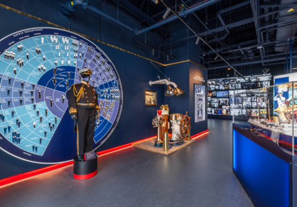 Admiral’s uniform and model of Britannia in the Visitor Centre exhibition space