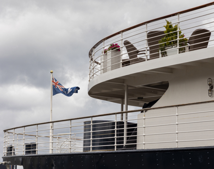 A flag on Fingal Hotel's deck is blowing in the wind in the Port of Leith. 
