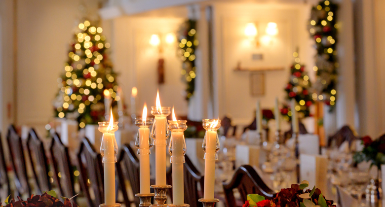 Christmas candles burning among decoration aboard Britannia