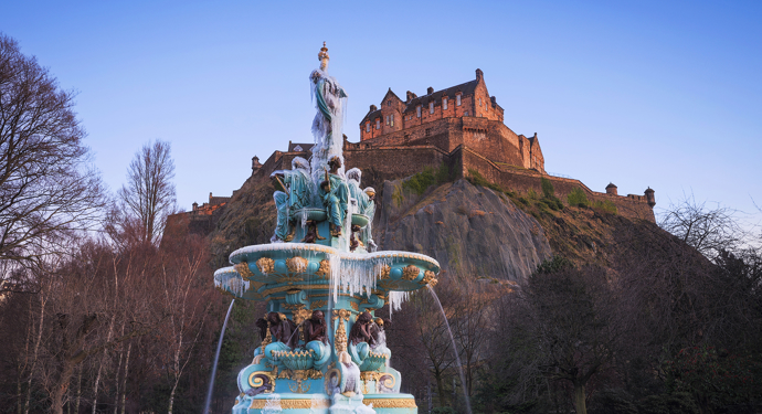 A Frozen Ross Fountain With Edinburgh Castle From Princes Street Gardens