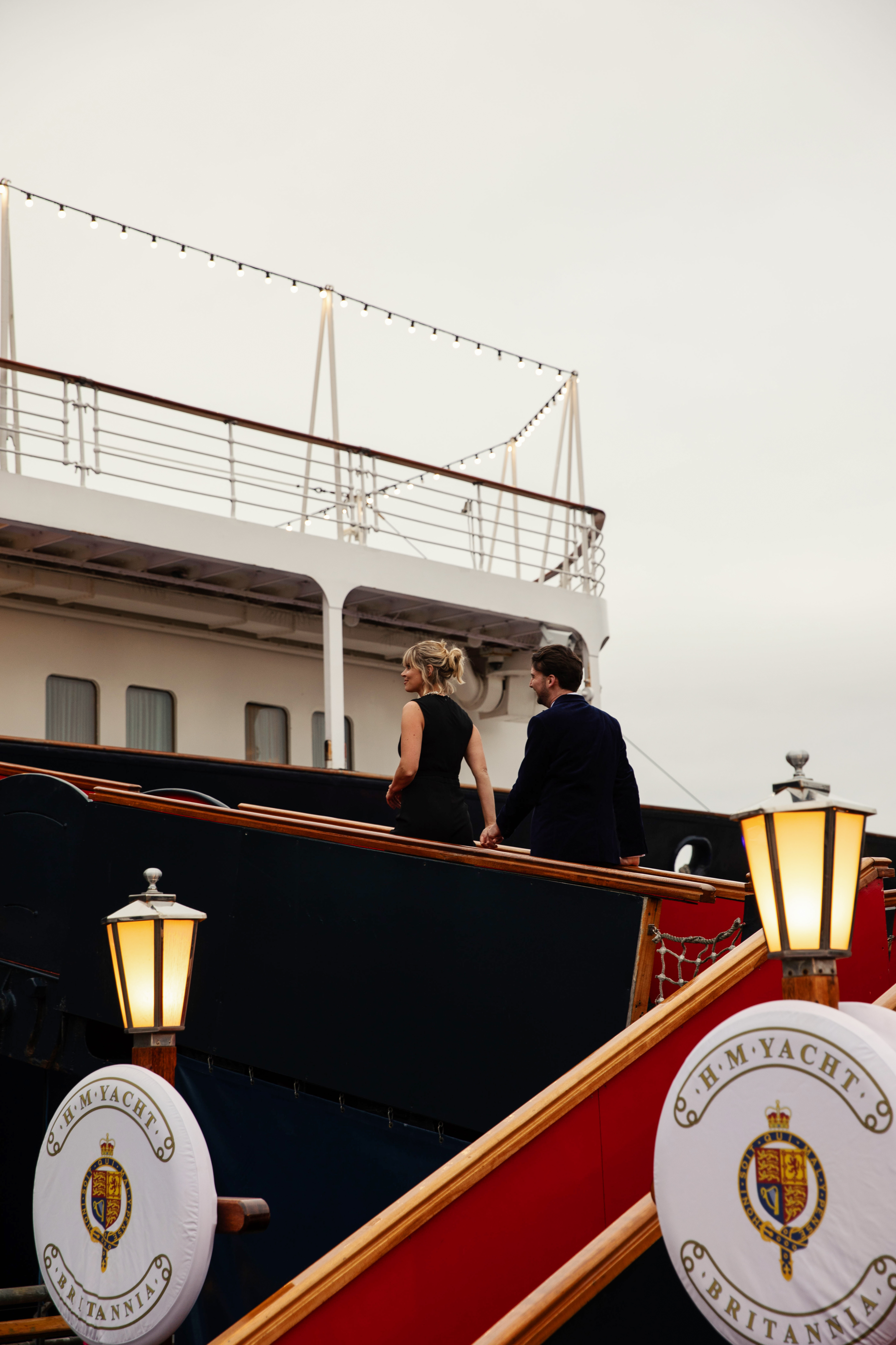 Couple walking onto a ship