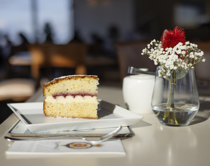 A Slice Of Victoria Sponge Cake In The Royal Deck Tearoom in Edinburgh. 