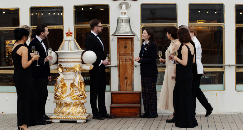 Private Guide Speaking To Guests On Deck