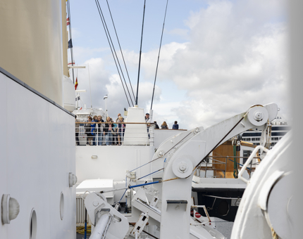Visitors on The Royal Yacht Britannia's Bridge in the Port of Leith. 