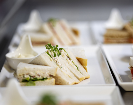 Plates of sandwiches.