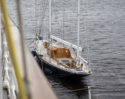 Royal Racing Yacht Bloodhound in the water next to Britannia. 