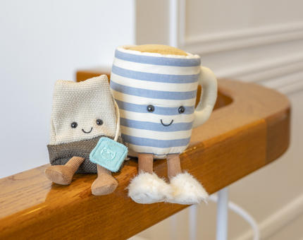 A Jellycat teabag and stripy blue mug plush toys