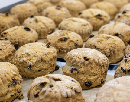 A tray of fruit scones fresh from the oven in the onboard Galley. 
