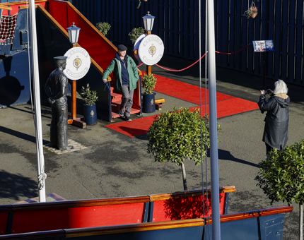 A view from above or a person taking a picture of a man on Britannia's Royal Brow. 