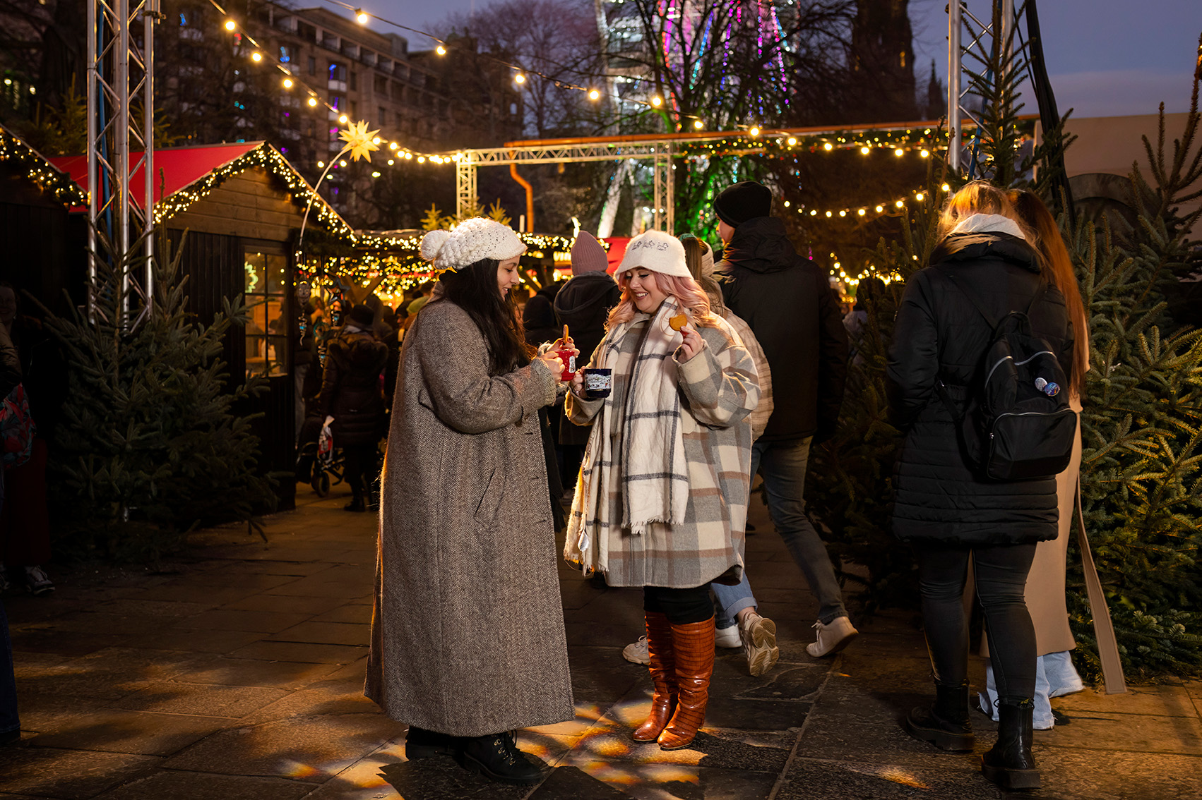 Two women at the Edinburgh Christmas Markets in Scotland