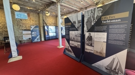 Panels in a room all set up for visitors. 