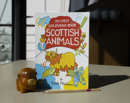 Scottish Animals Colouring book and a squishi Highland cow. 