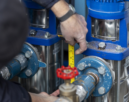 Stuart Measuring for a new pump in the Pump House.