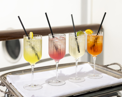 A Selection of four Summer Spritzs' on a tray. 
