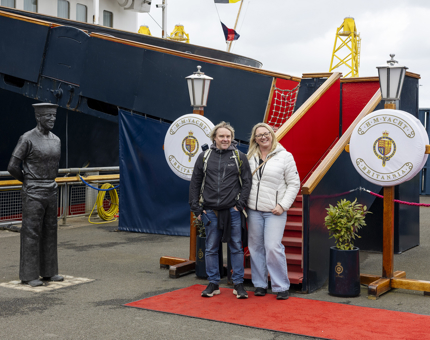 Two visitors at The Royal Yacht Britannia's Royal Brow in Leith. 