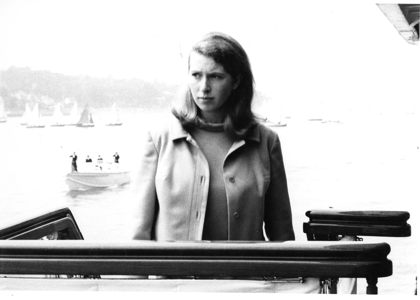 Princess Anne standing by the railings on Britannia. 
